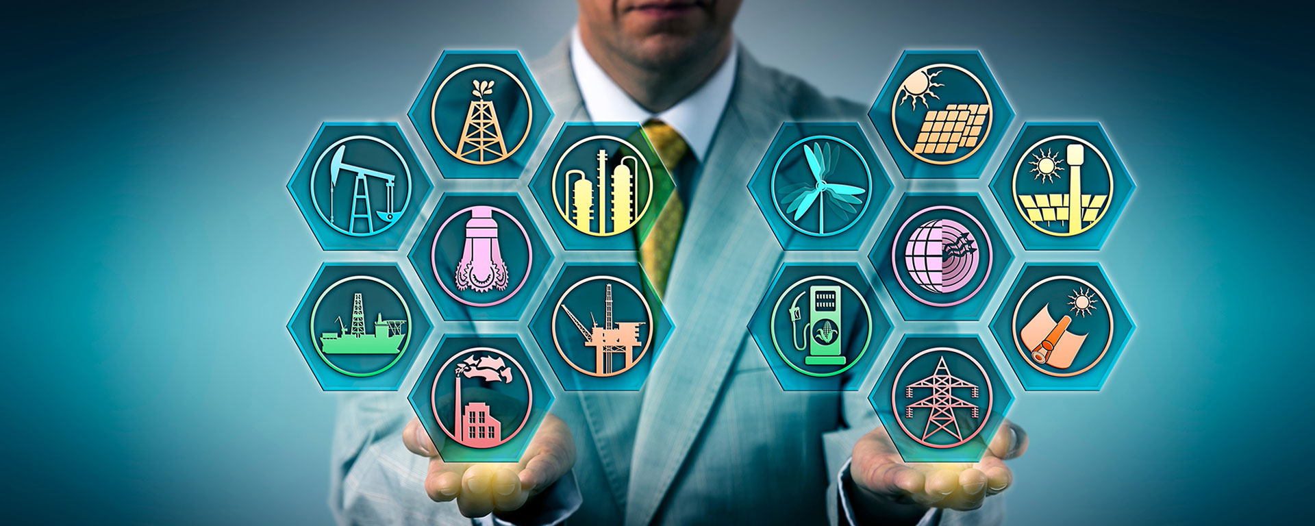 Man holding various energy related icons in his hands.