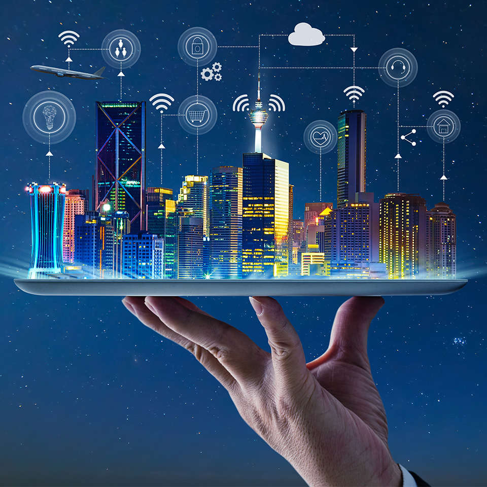 Conceptual image of a hand holding a tray carrying a city skyline with various tech icons hovering above