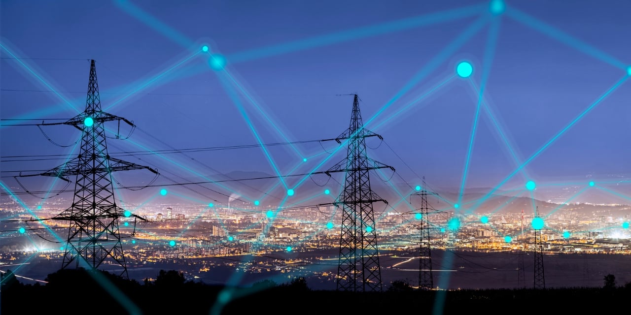 Electrical towers during sunset