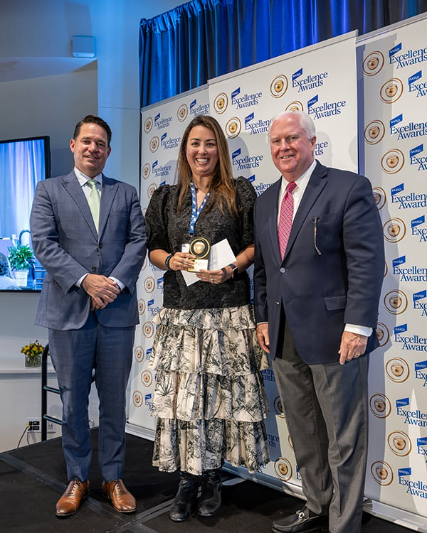 An educator receiving a 2024 Baird Excellence Award